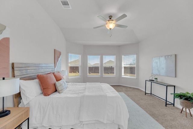 carpeted bedroom with baseboards, visible vents, and ceiling fan