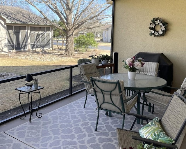 balcony featuring outdoor dining area