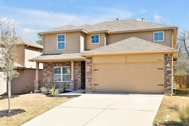 traditional home featuring a garage, brick siding, driveway, and a shingled roof