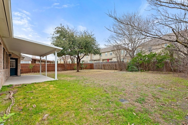 view of yard featuring a patio and a fenced backyard