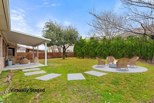 view of yard with a patio area and fence