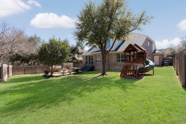 view of yard featuring a fenced backyard