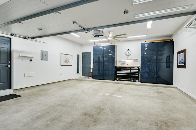 5908 Taylor Draper Cv, Austin, TX 78759 - garage with electric panel and a garage door opener