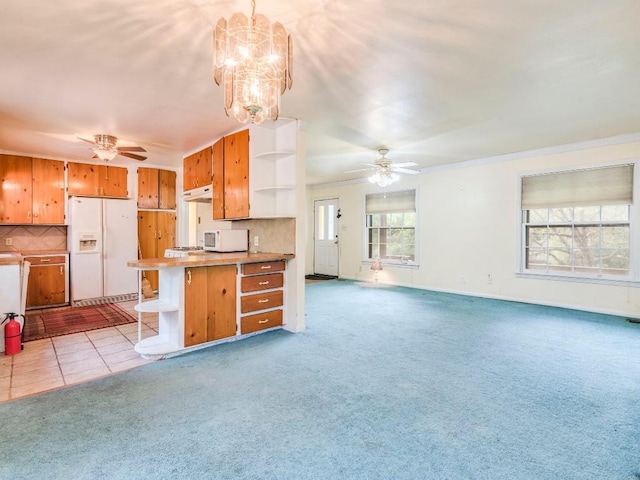 kitchen featuring open shelves, light colored carpet, backsplash, white appliances, and under cabinet range hood