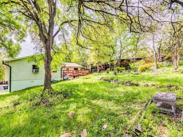 view of yard with a deck