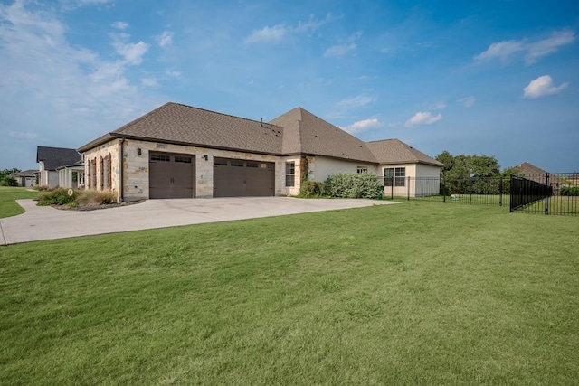 227 Dally Ct, Dripping Springs, TX 78620 - view of front of property featuring an attached garage, concrete driveway, and stone siding