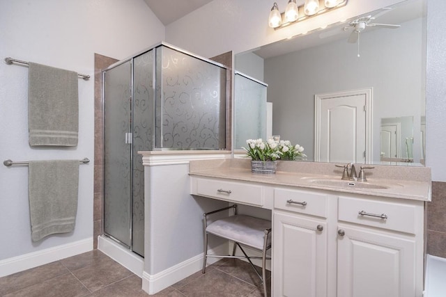 bathroom featuring a ceiling fan, tile patterned flooring, vanity, and a shower stall