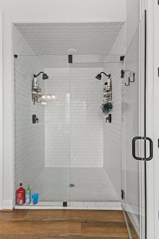 full bathroom with a shower stall