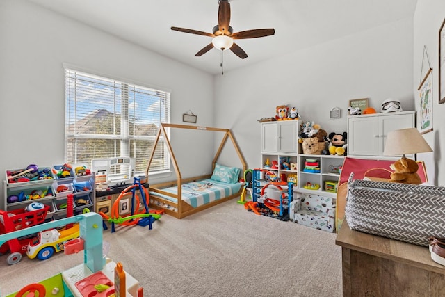 rec room featuring a ceiling fan and carpet flooring