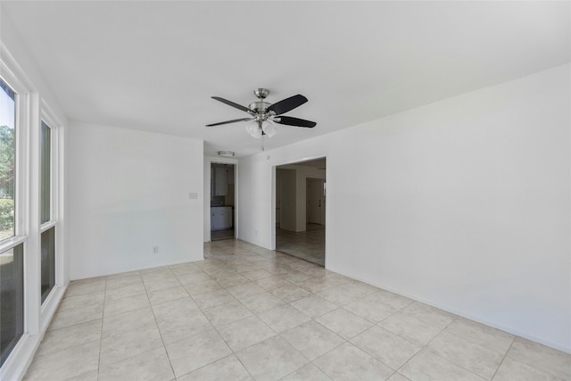 unfurnished room with ceiling fan