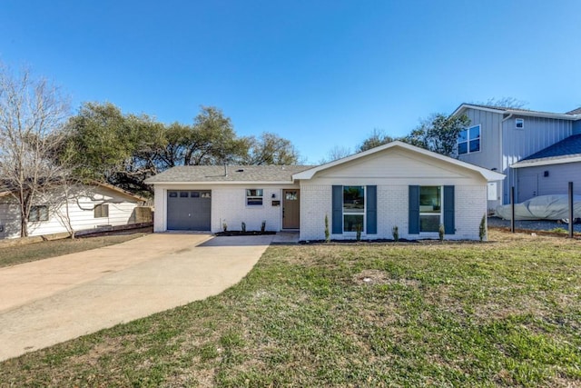 ranch-style home featuring a garage, driveway, brick siding, and a front lawn