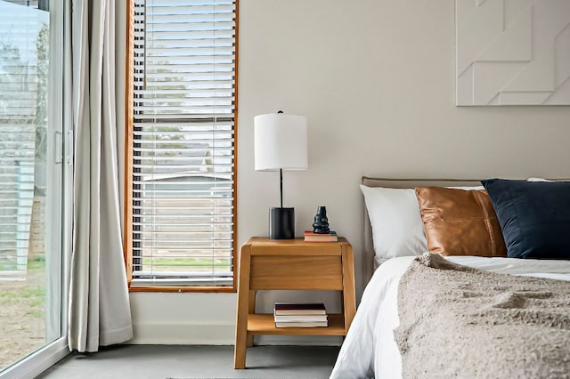 bedroom featuring baseboards