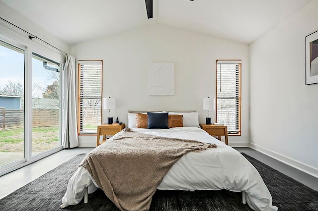 bedroom with lofted ceiling, access to exterior, multiple windows, and baseboards