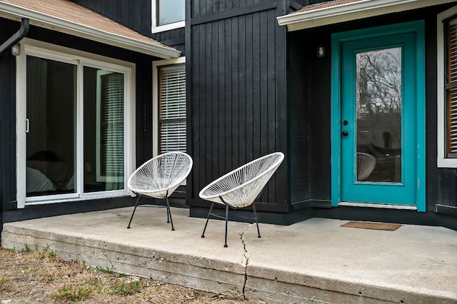 doorway to property with a patio area