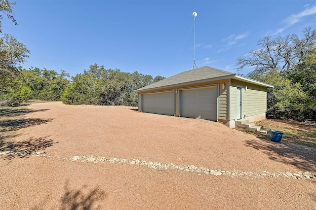 view of detached garage
