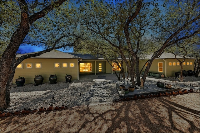 rear view of house with a patio
