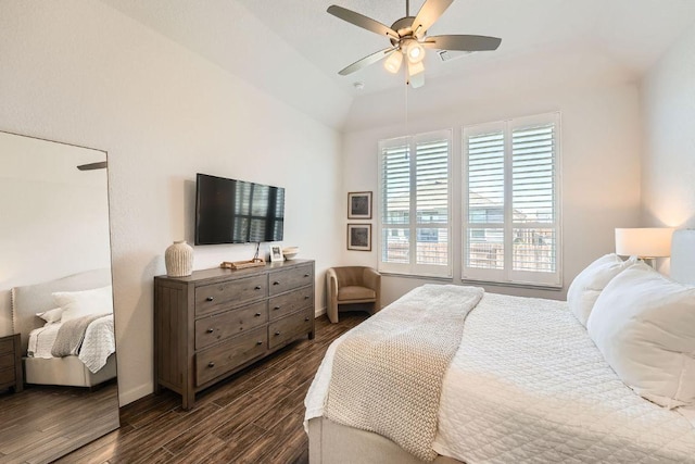 bedroom featuring lofted ceiling, ceiling fan, and dark wood-style flooring