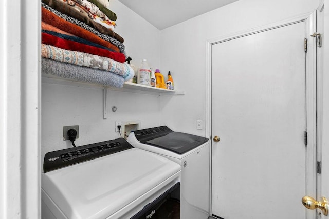 washroom with laundry area and separate washer and dryer