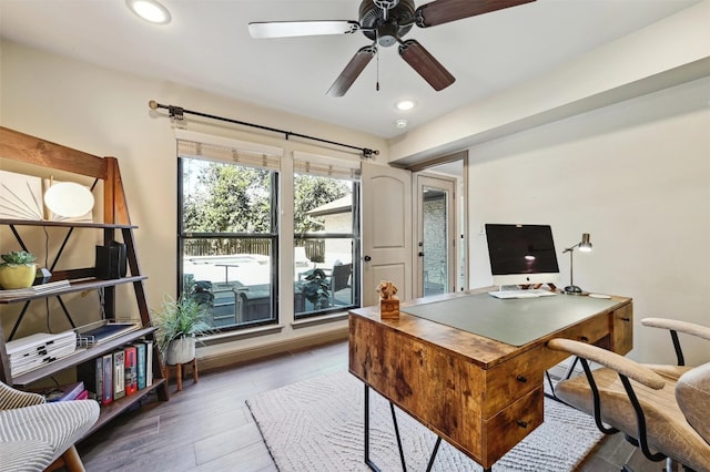 office featuring recessed lighting, wood finished floors, and a ceiling fan