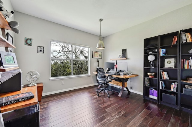 office space featuring wood finished floors and baseboards