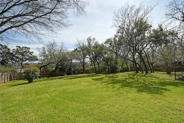 view of yard featuring fence