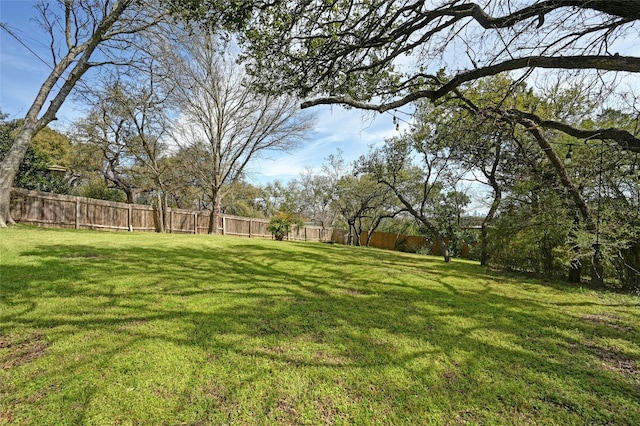 view of yard with fence