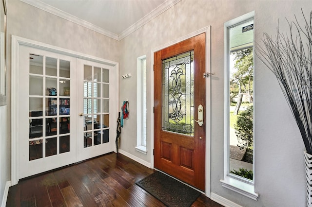 foyer with ornamental molding, french doors, dark wood-style flooring, and baseboards