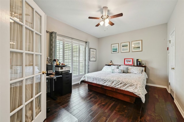 bedroom featuring ceiling fan, baseboards, and dark wood-type flooring