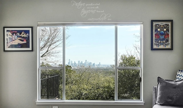 doorway to outside with a healthy amount of sunlight and a city view