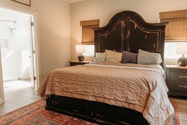 bedroom with wood finished floors