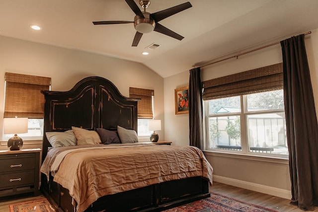 bedroom featuring visible vents, baseboards, recessed lighting, vaulted ceiling, and light wood-style flooring