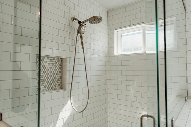 bathroom featuring a shower stall