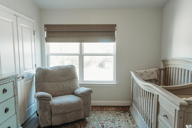 bedroom with multiple windows and baseboards