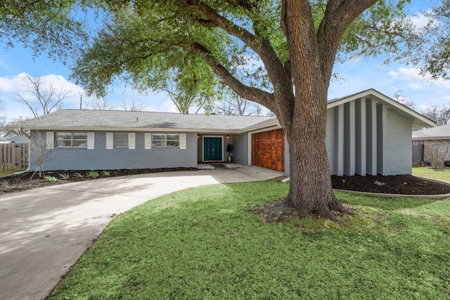 611 Virginia Dr, Round Rock, TX 78664 - view of front of property with an attached garage and concrete driveway