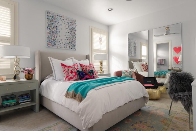 bedroom featuring wood finished floors