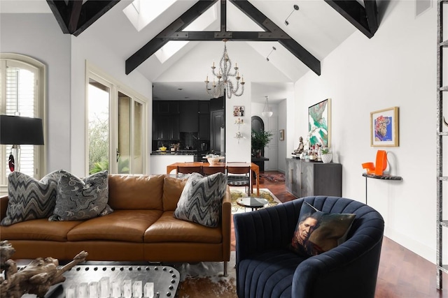 living area featuring a wealth of natural light, beamed ceiling, a skylight, and an inviting chandelier