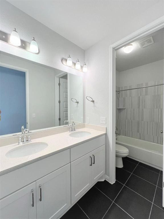 full bathroom with tile patterned flooring, visible vents, a sink, and double vanity