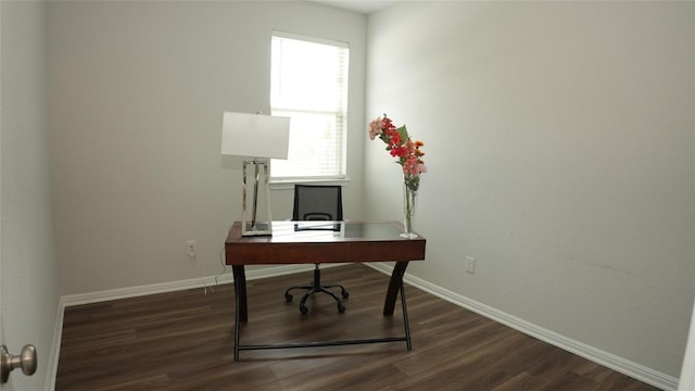 home office featuring dark wood-style flooring and baseboards