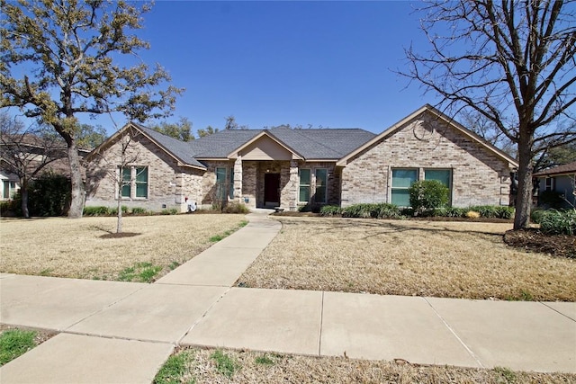 view of front of property featuring brick siding