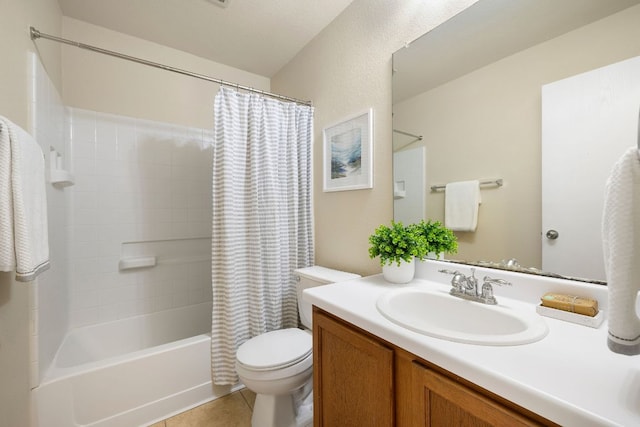 bathroom featuring shower / bath combo, vanity, toilet, and tile patterned floors