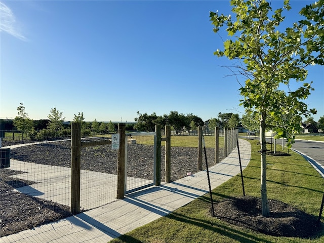 surrounding community featuring a gate
