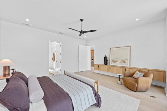 bedroom featuring recessed lighting, visible vents, and light wood-style flooring