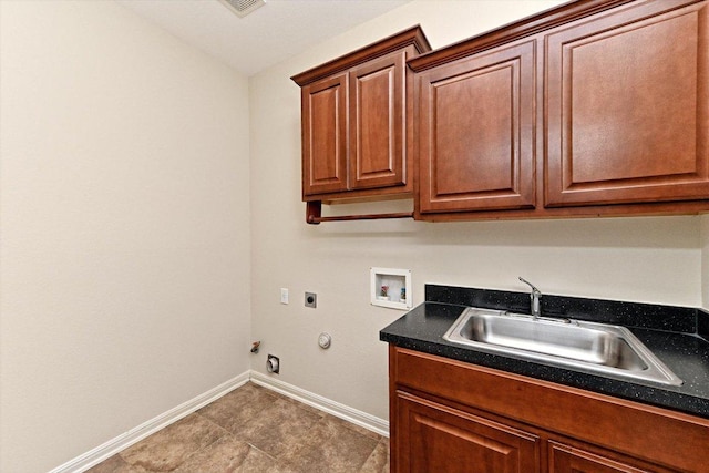 laundry room featuring washer hookup, cabinet space, a sink, gas dryer hookup, and electric dryer hookup