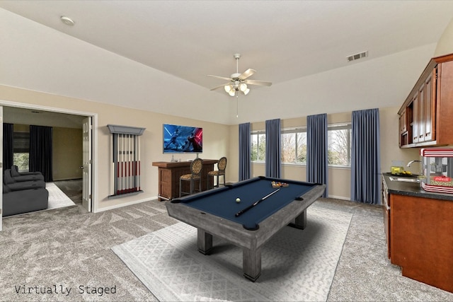 rec room with light carpet, billiards, a sink, visible vents, and a bar