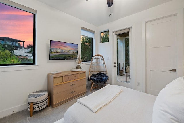 carpeted bedroom with a ceiling fan