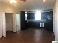 kitchen featuring a ceiling fan