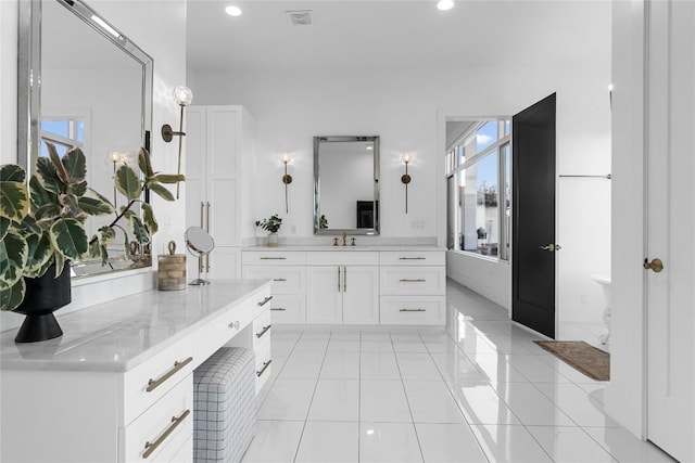 bathroom featuring tile patterned flooring, vanity, visible vents, and recessed lighting