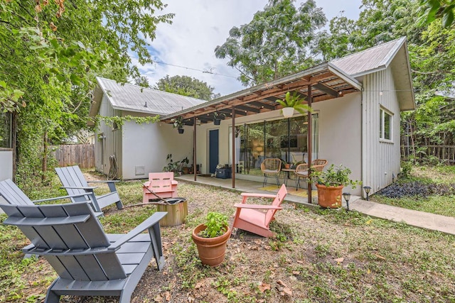 1908 E 21st St Unit 1And 2, Austin, TX 78722 - back of property with a patio area and a metal roof