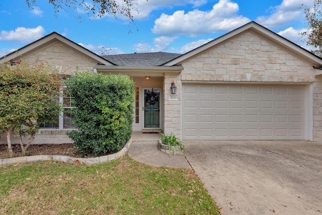 ranch-style home featuring a garage, stone siding, a shingled roof, and concrete driveway