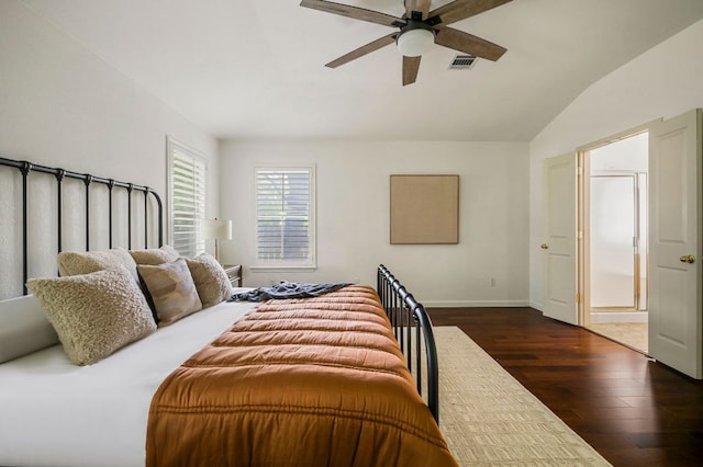 bedroom featuring baseboards, ceiling fan, dark wood-style flooring, and vaulted ceiling